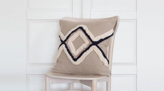 Beige boho cushion with diamond pattern