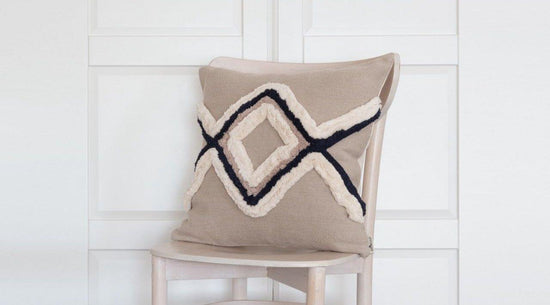 Beige boho cushion with diamond pattern