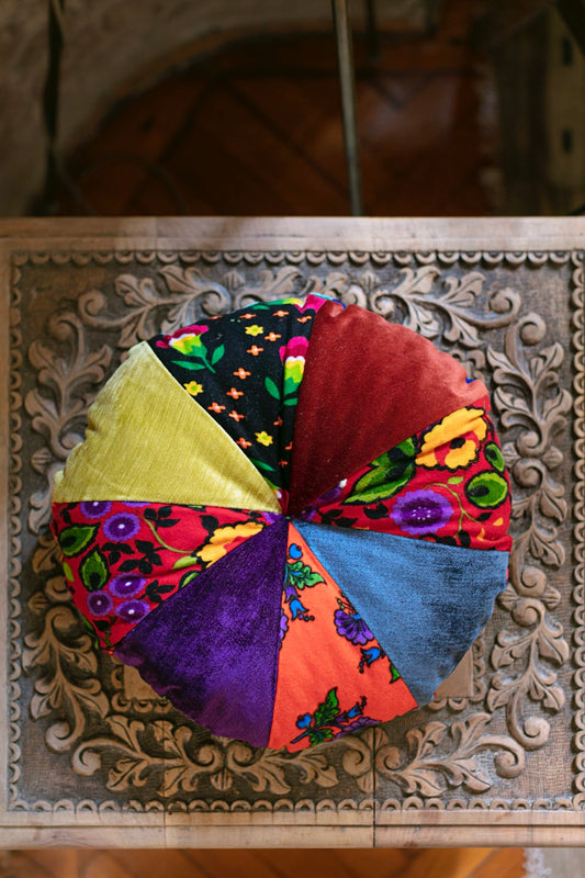 Handmade patchwork cushion round viewed from the top