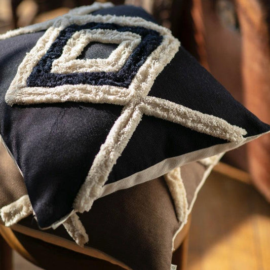 Navy blue Bohemian pillow cover with hand-stitched diamond pattern and fringe details
